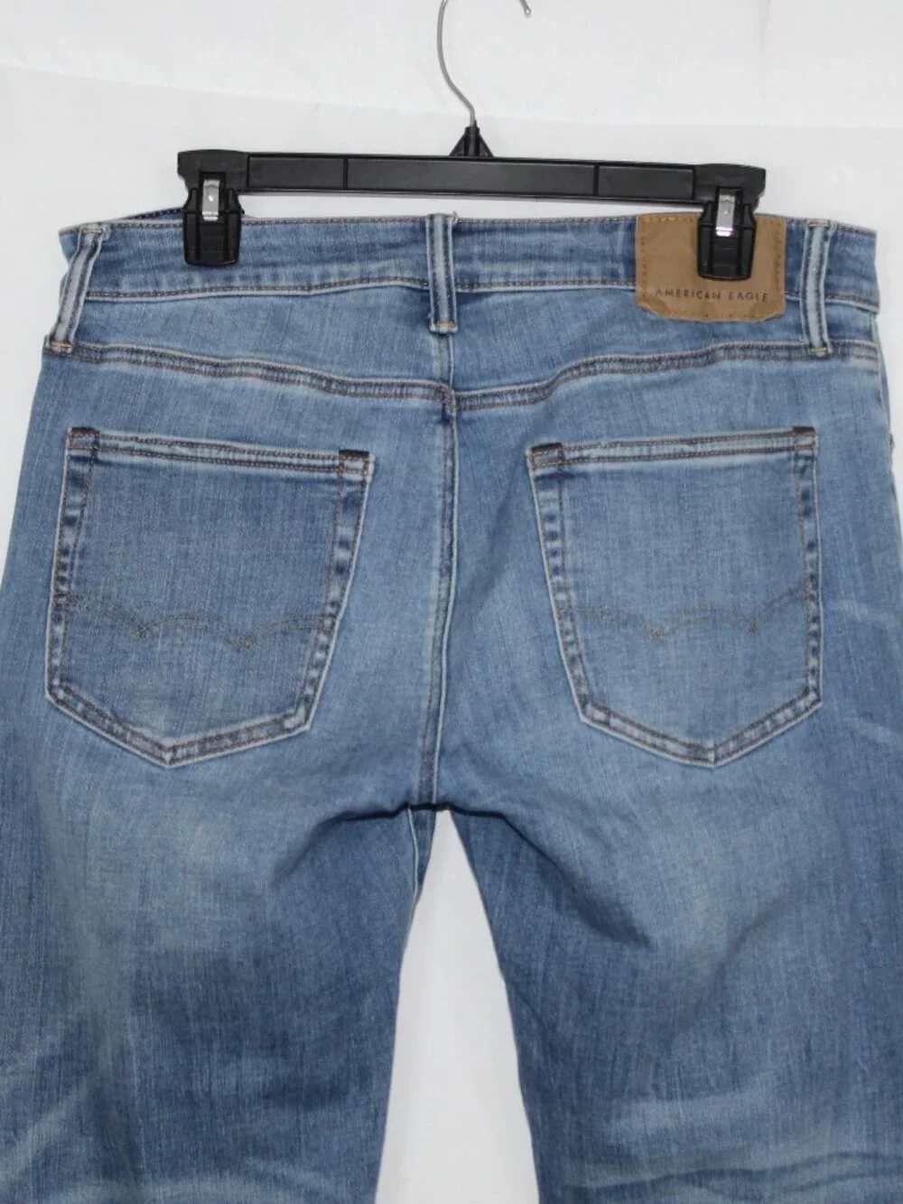 American Eagle slim straight next level stretch medium wash mid rise